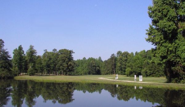 view of golf course pond