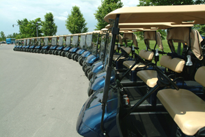 row of golf carts ready for a tournament